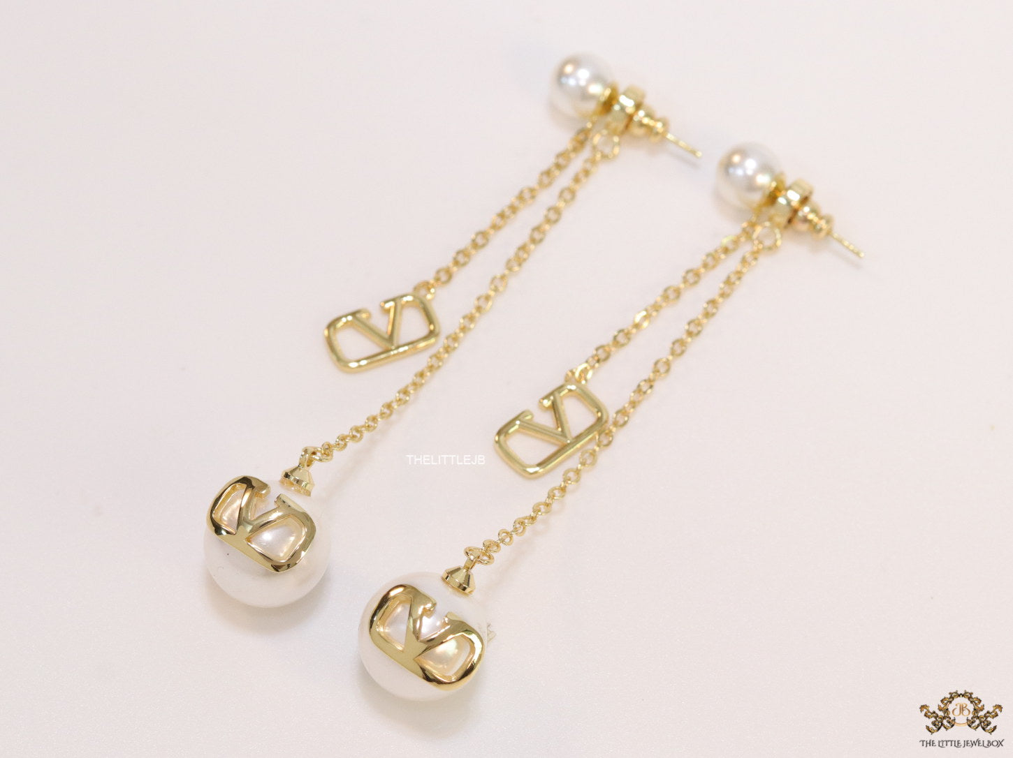 Gold plated long chain alphabet dangles with pearl