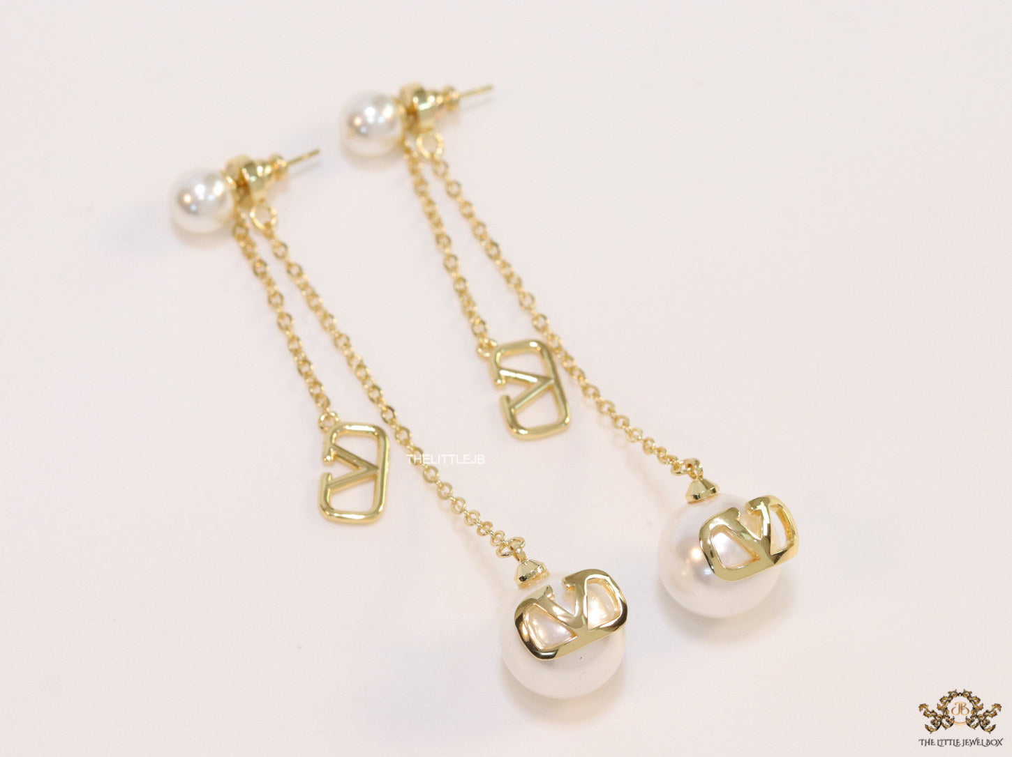 Gold plated long chain alphabet dangles with pearl