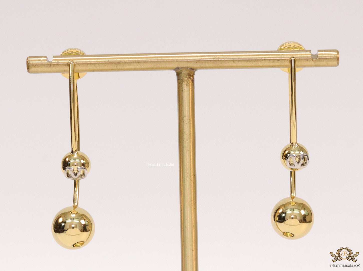 Open long twin lobed golden earrings