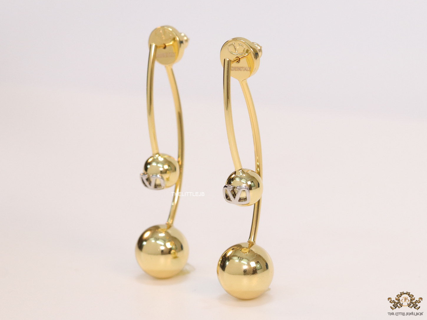 Open long twin lobed golden earrings