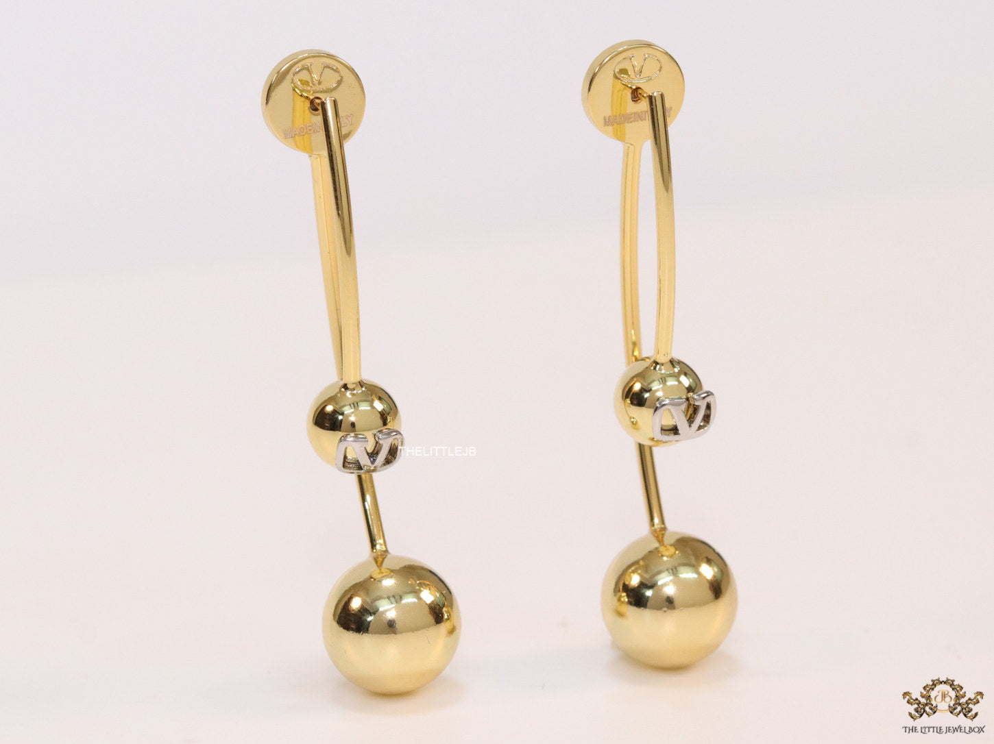 Open long twin lobed golden earrings