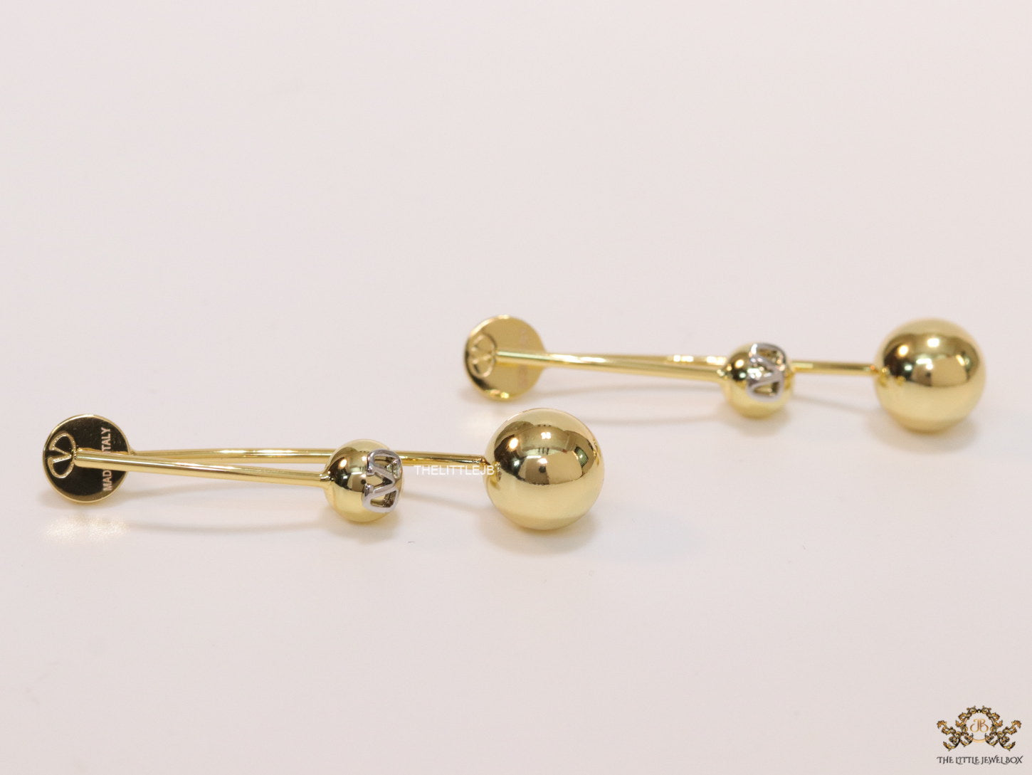Open long twin lobed golden earrings