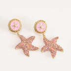 Pink gold star dangles