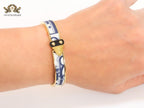 Alphabet D gold and black & white textured bracelet