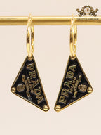 Black enamel and gold hoop dangles