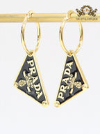 Black enamel and gold hoop dangles