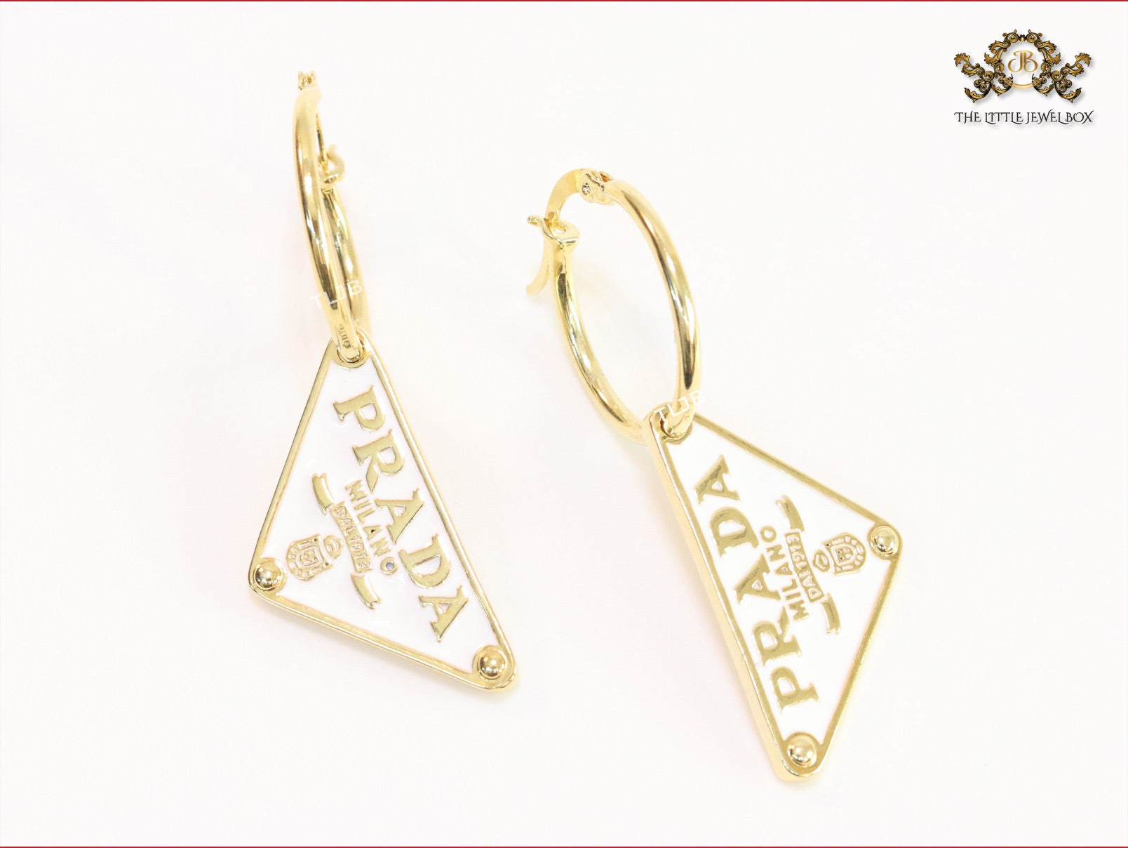 White enamel and gold hoop dangles