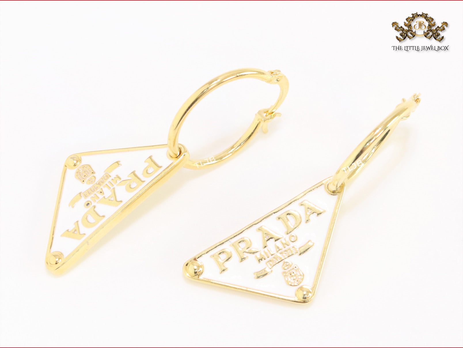 White enamel and gold hoop dangles