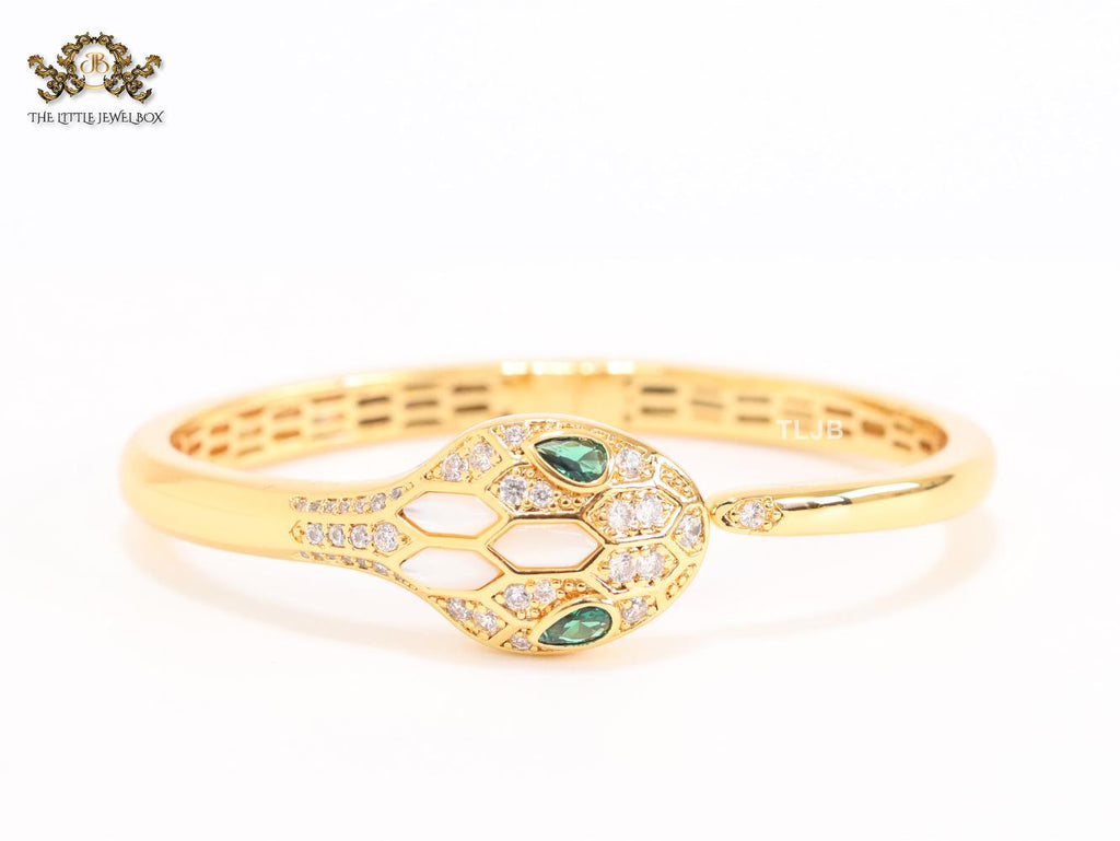 Snake head gold and white MOP bracelet with cz