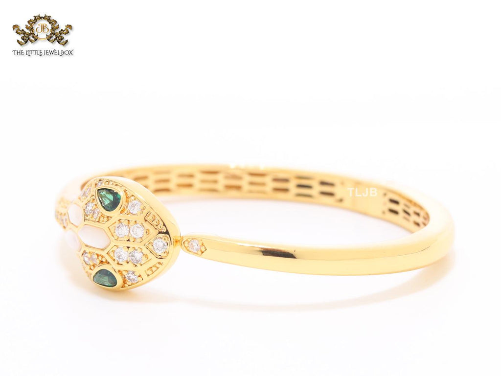 Snake head gold and white MOP bracelet with cz