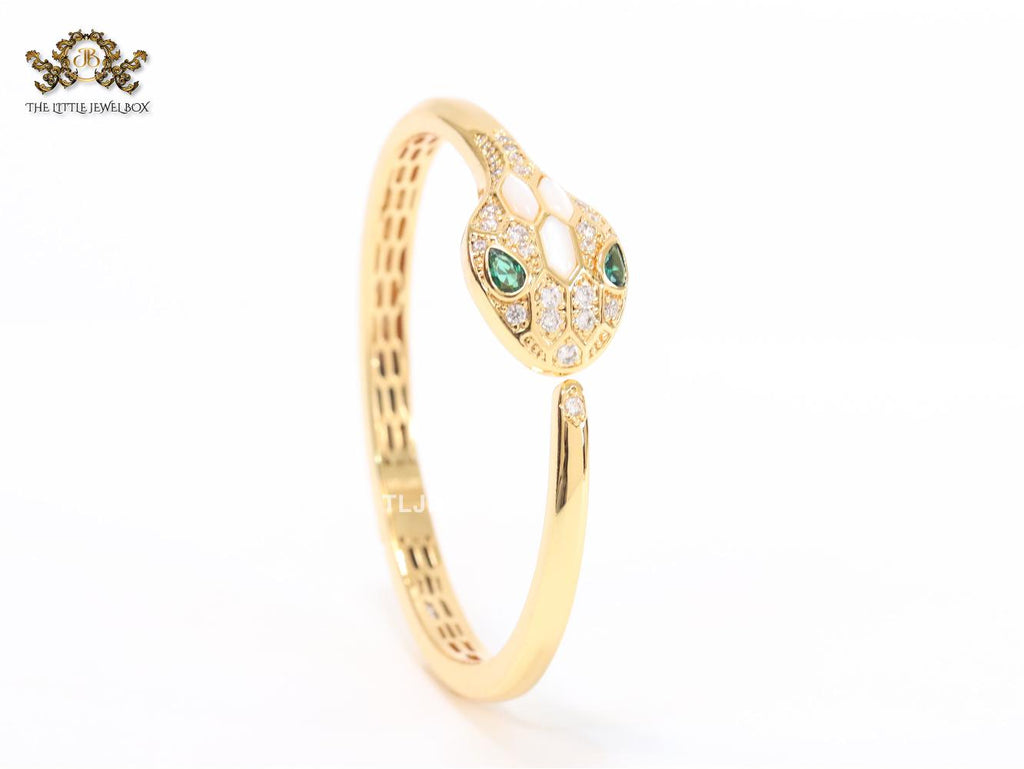 Snake head gold and white MOP bracelet with cz