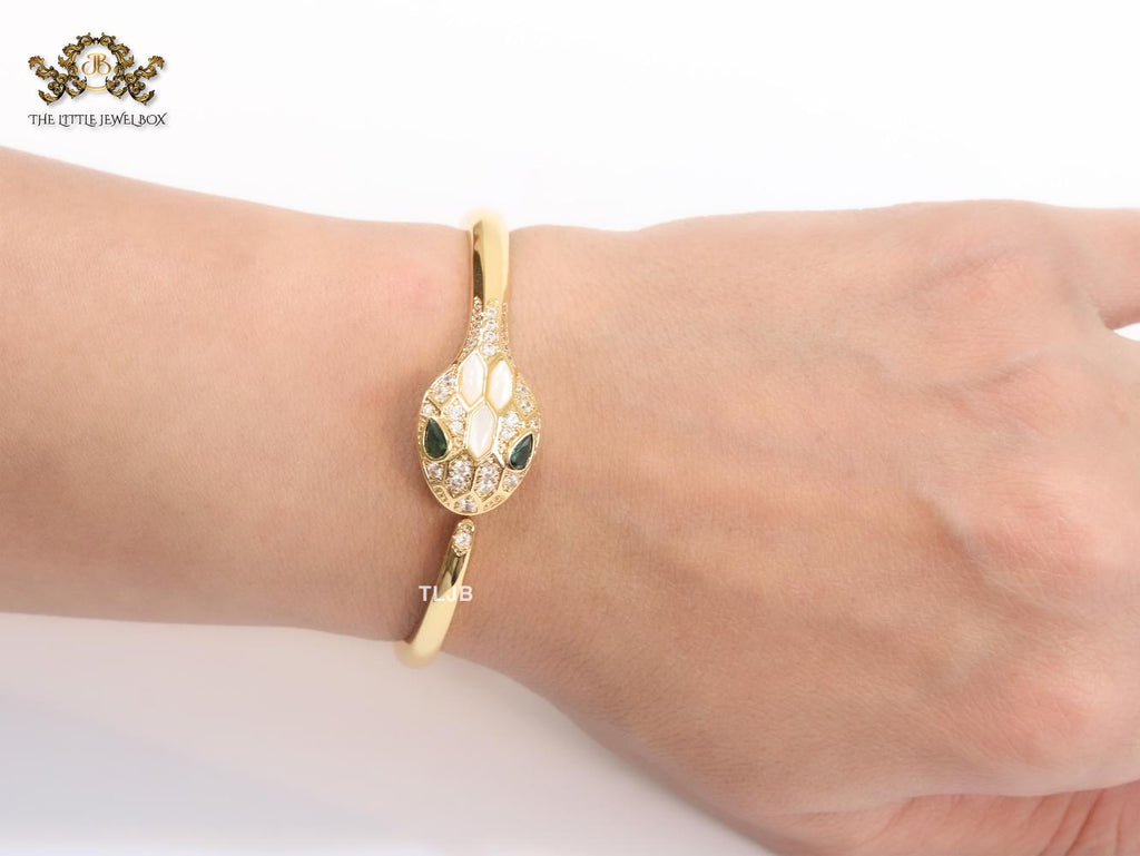 Snake head gold and white MOP bracelet with cz
