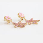 Pink gold star dangles