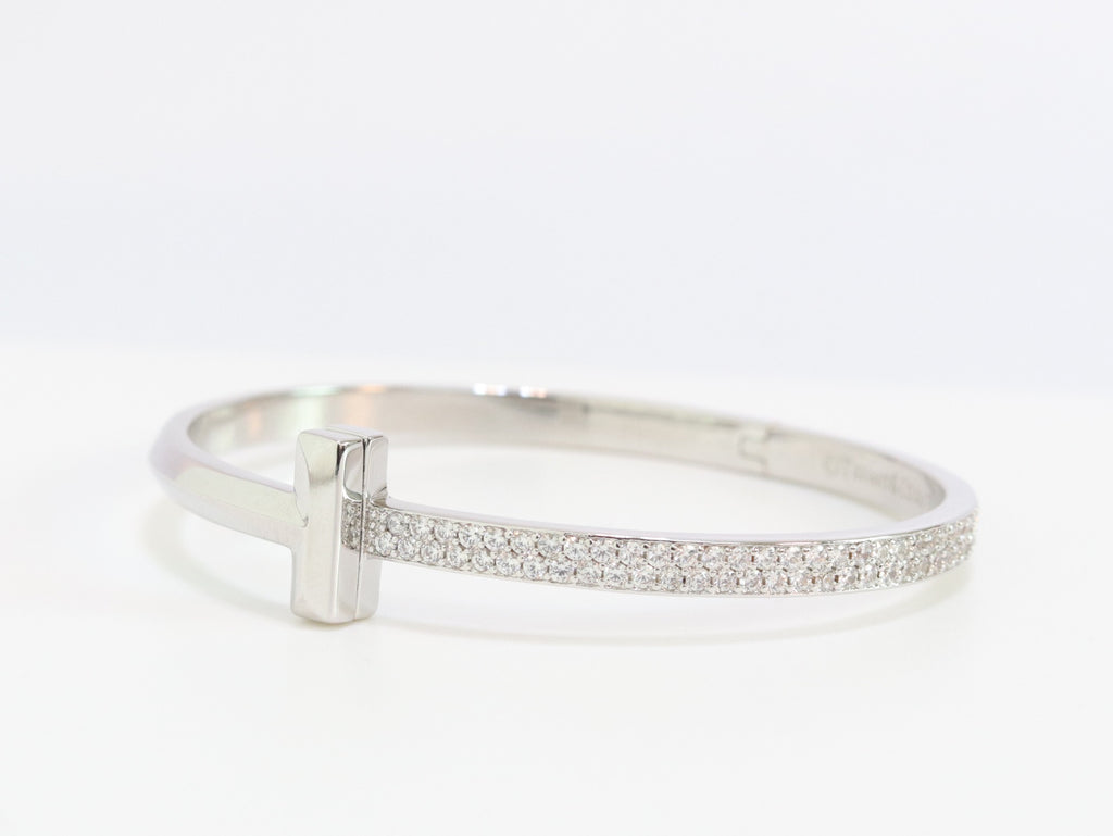 Alphabet T bracelet with half CZ in platinum finish