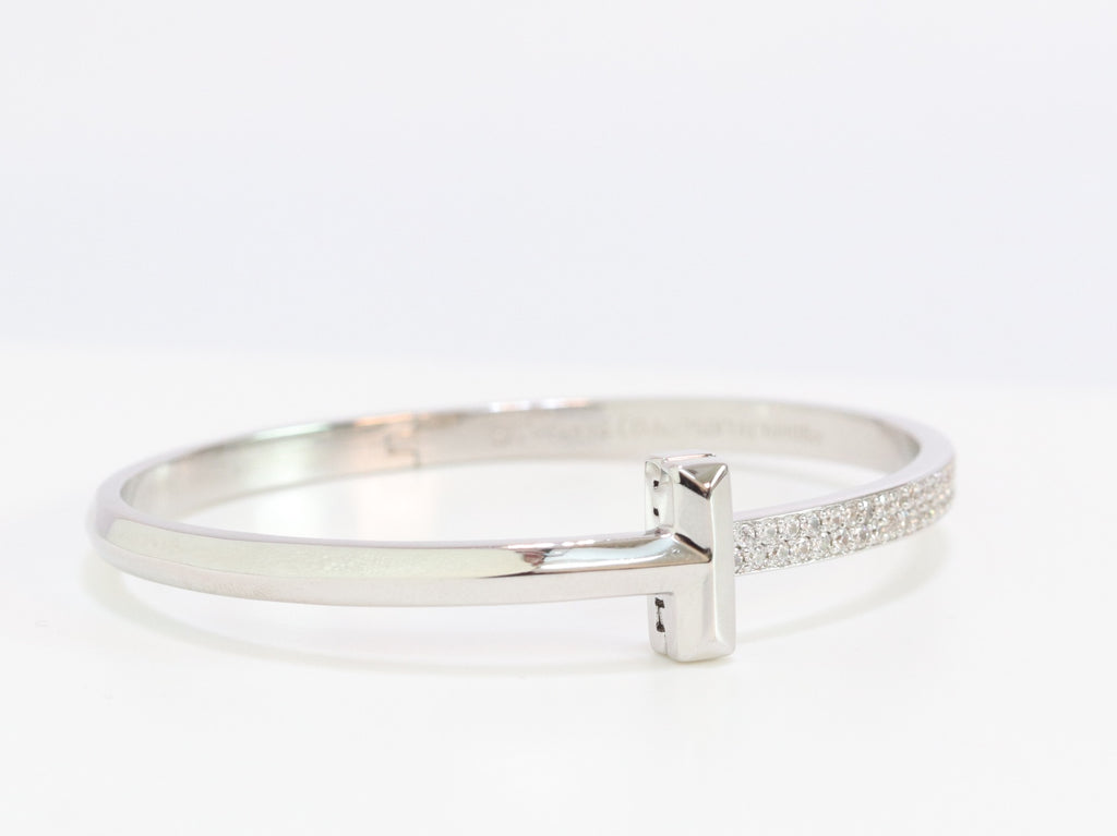 Alphabet T bracelet with half CZ in platinum finish