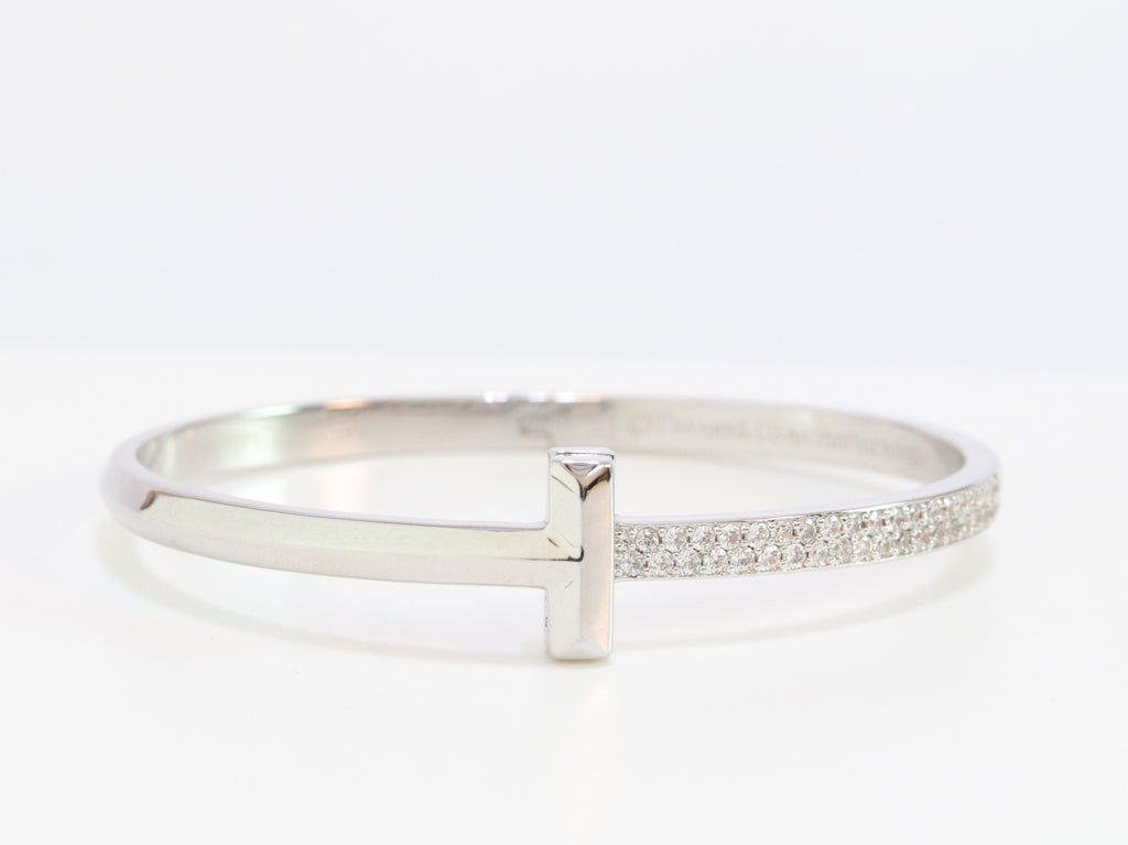 Alphabet T bracelet with half CZ in platinum finish