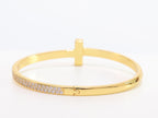 Alphabet T bracelet with half CZ in gold finish