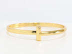 Alphabet T bracelet in gold
