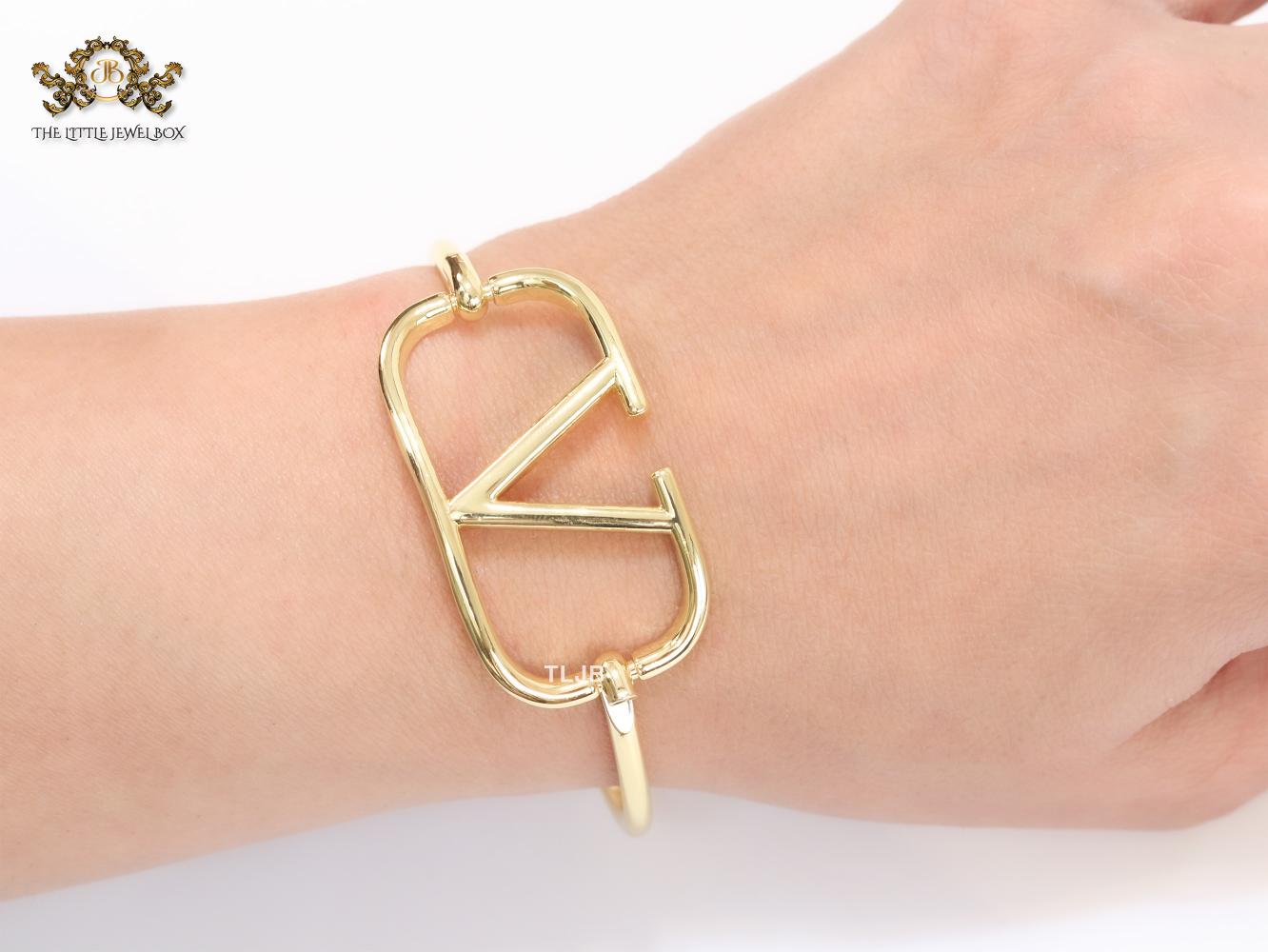 Sleek open V gold bracelet