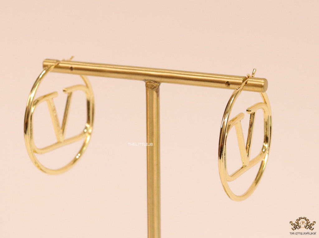 Gold plated hoops with alphabet motif