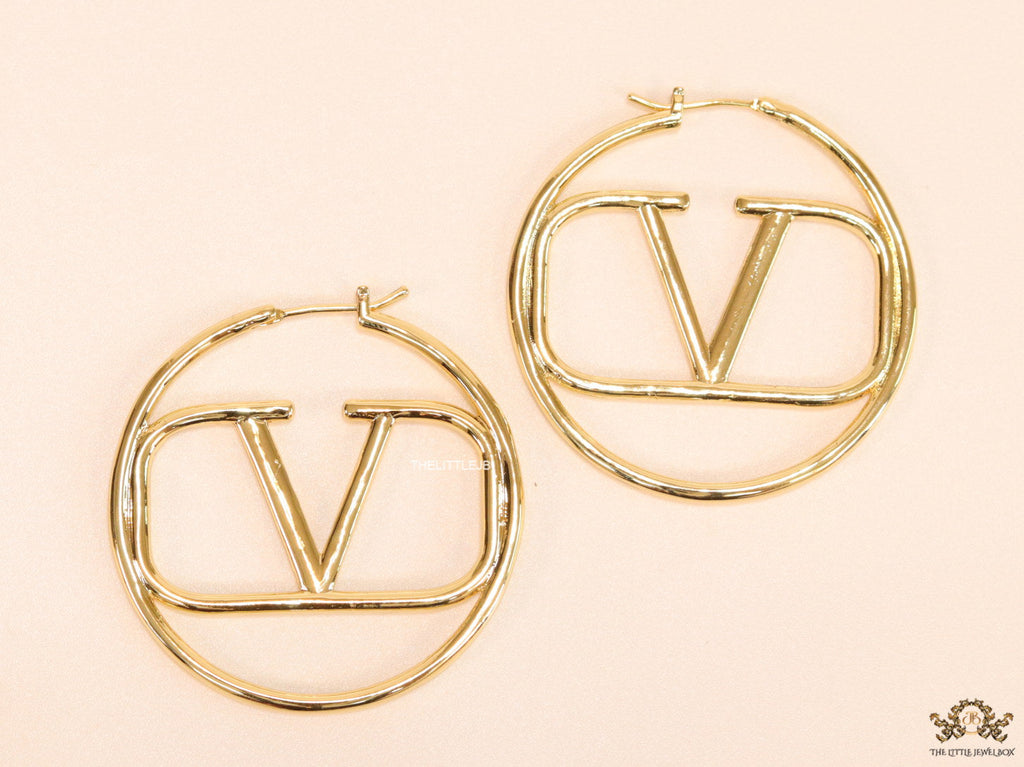 Gold plated hoops with alphabet motif