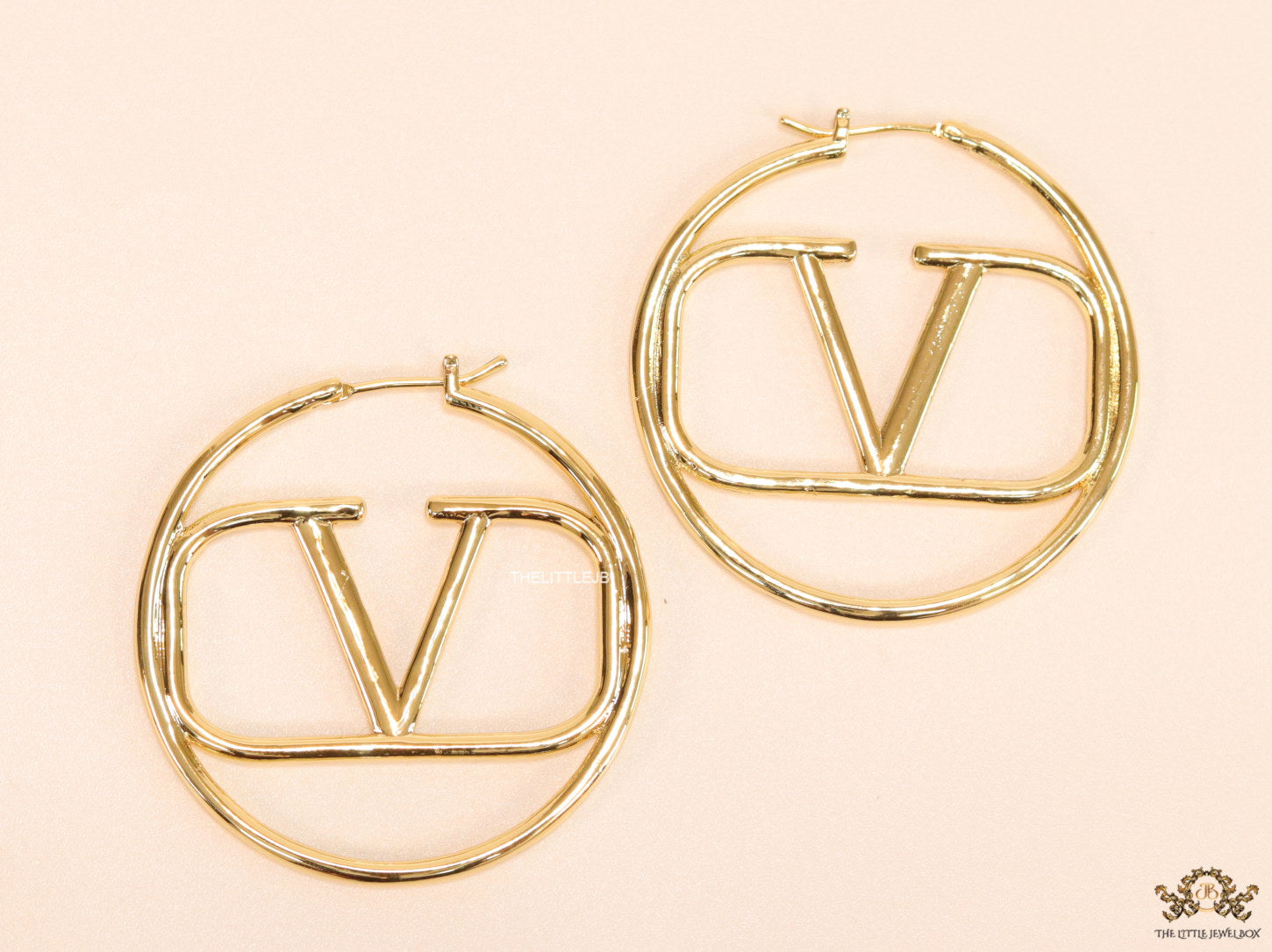 Gold plated hoops with alphabet motif