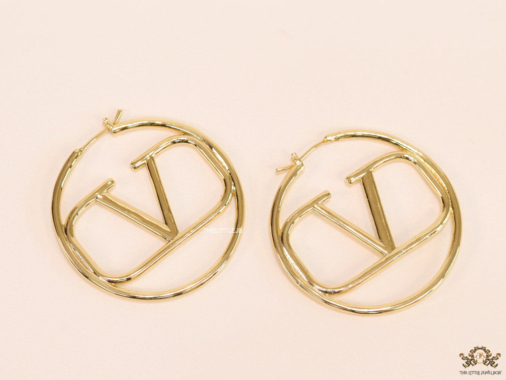 Gold plated hoops with alphabet motif