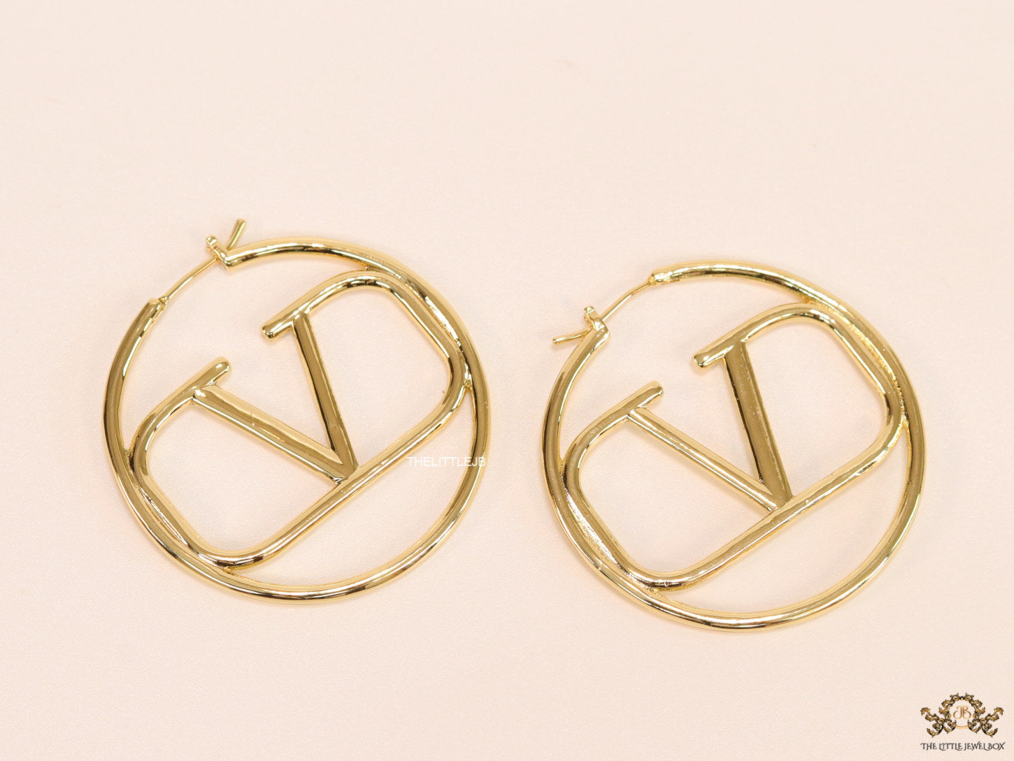 Gold plated hoops with alphabet motif