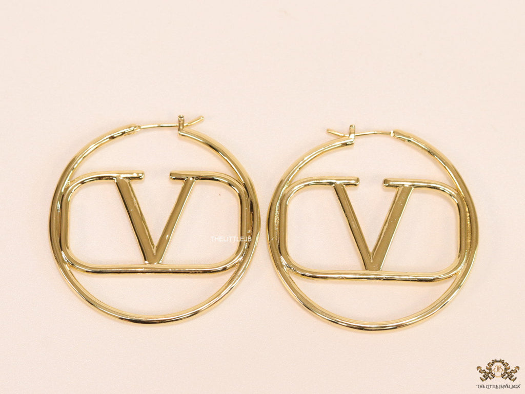 Gold plated hoops with alphabet motif