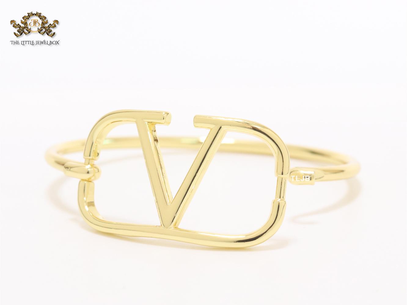 Sleek open V gold bracelet