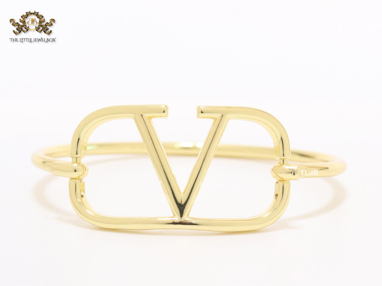 Sleek open V gold bracelet