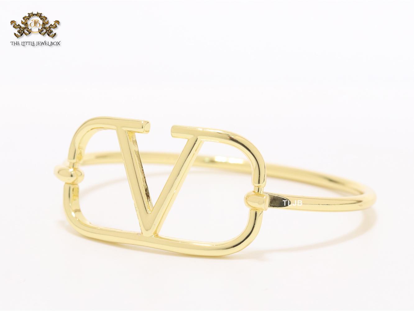 Sleek open V gold bracelet