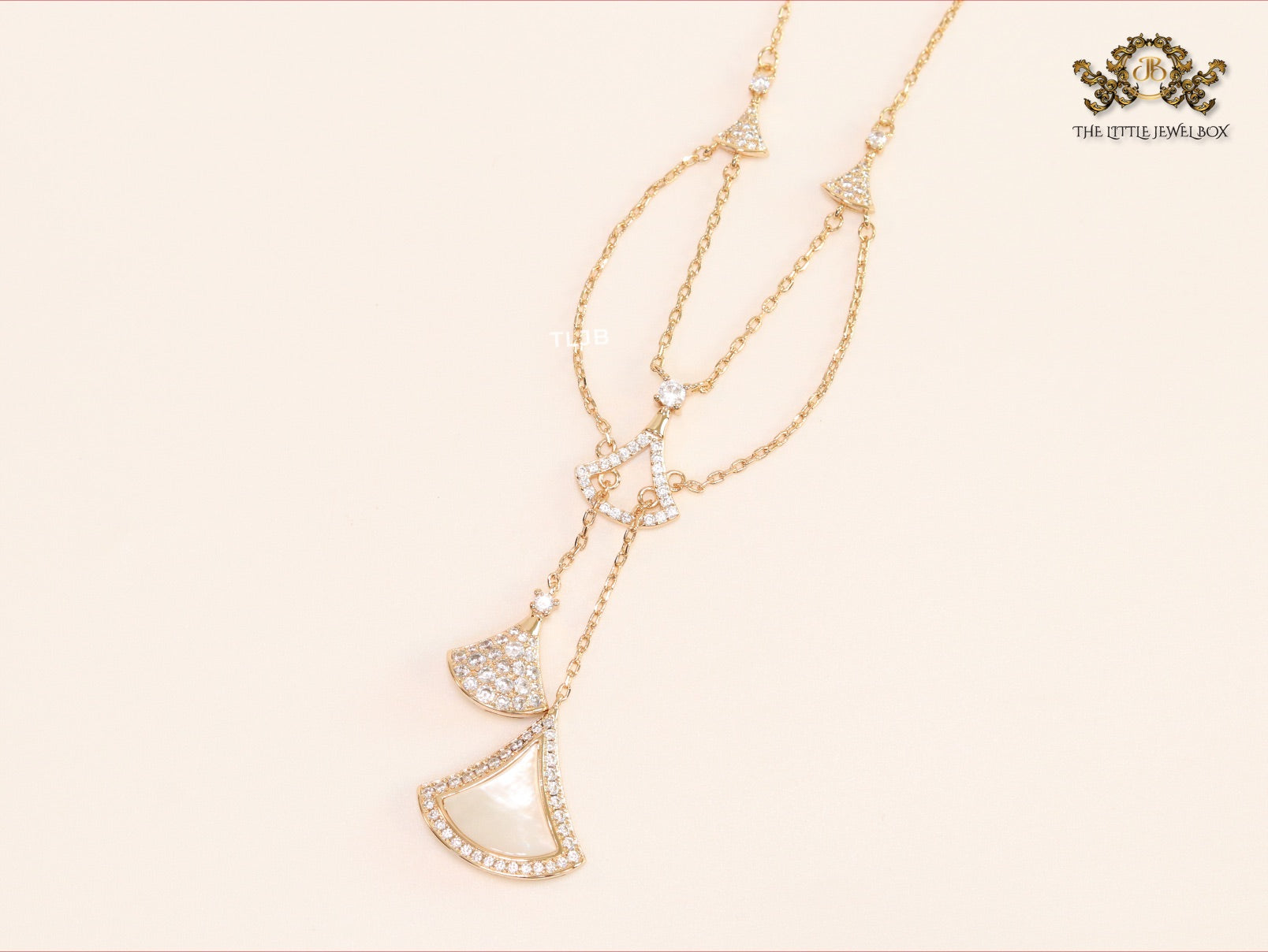 White enamel and Cz charms chain