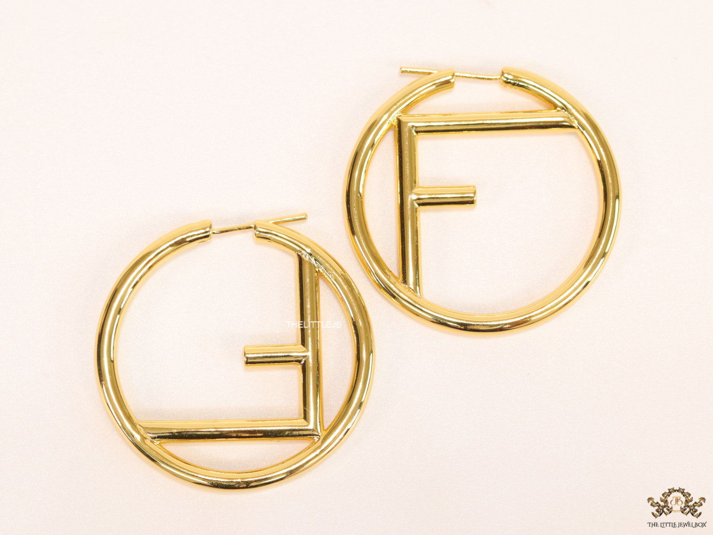 Gold plated hoops with alphabet F motif 40mm