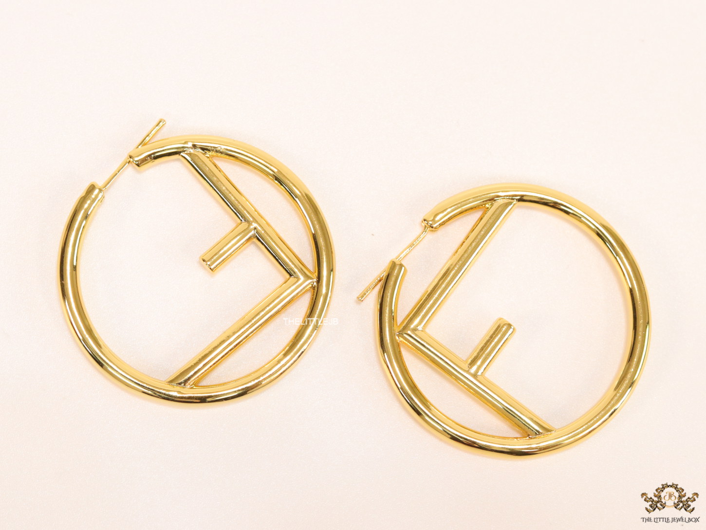 Gold plated hoops with alphabet F motif 40mm