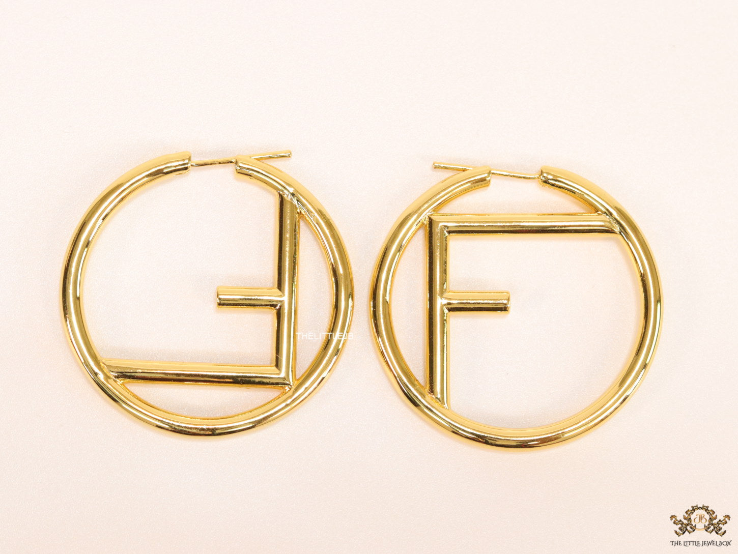 Gold plated hoops with alphabet F motif 40mm
