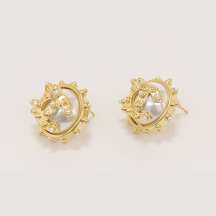 Double C gold spiked studs