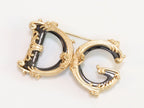 Alphabet D G gold plated brooch