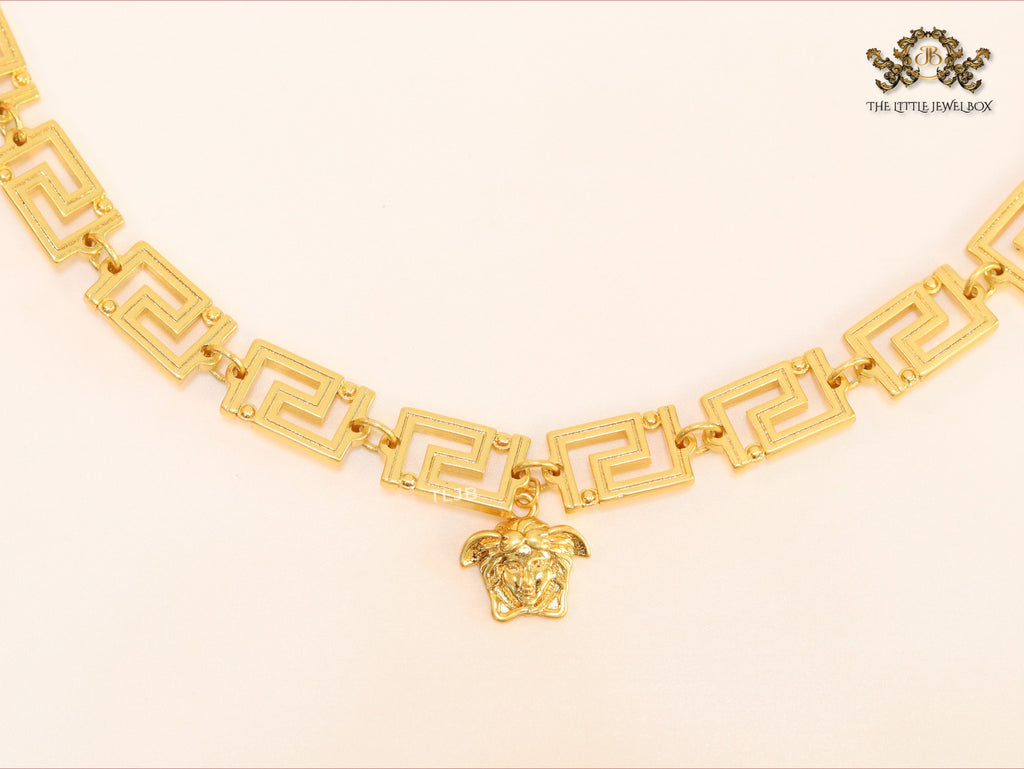 Medusa charm gold link chain
