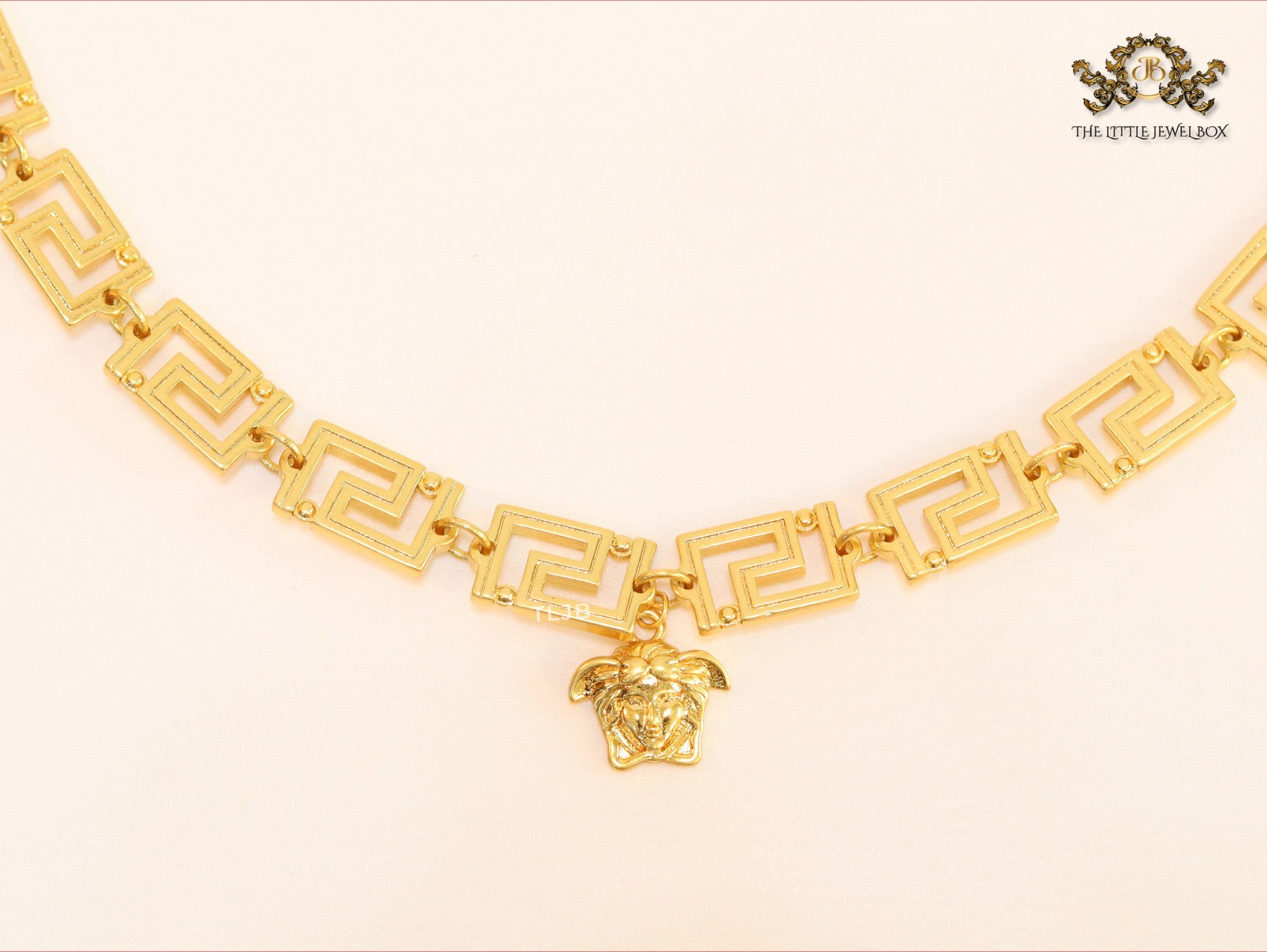 Medusa charm gold link chain