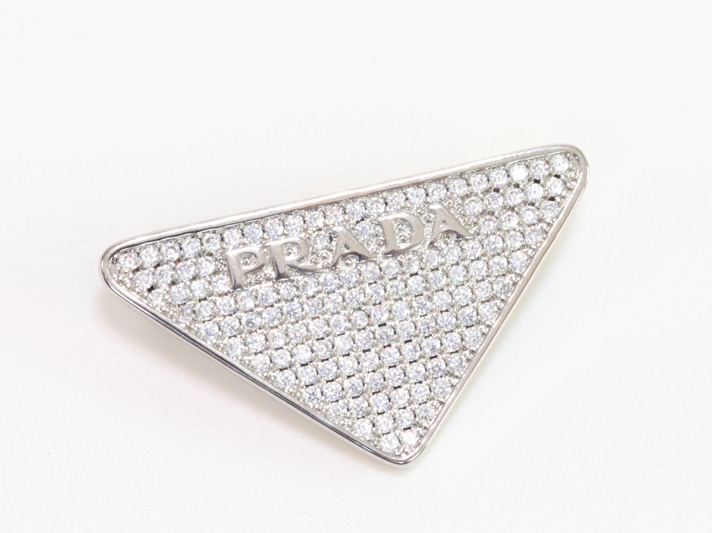 Alphabet P triangle CZ brooch in platinum finish