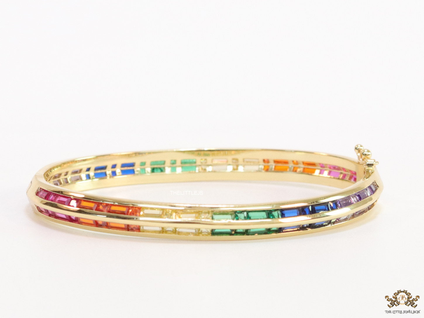 Openable Gold plated bracelet with multi cz baguettes