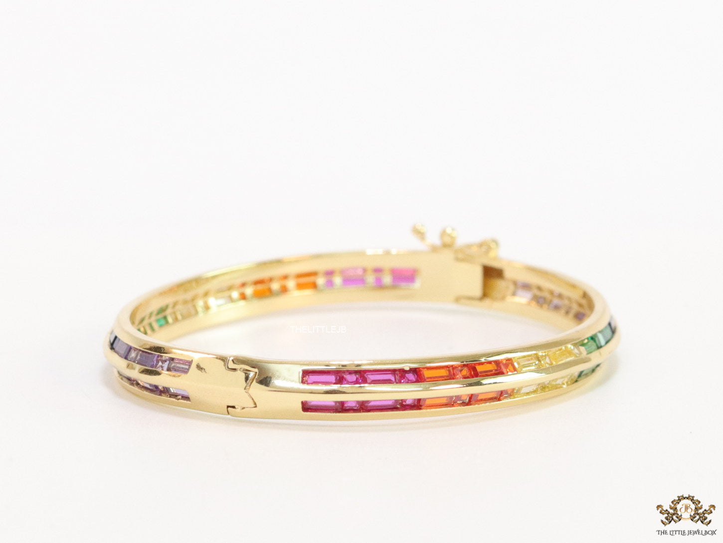Openable Gold plated bracelet with multi cz baguettes