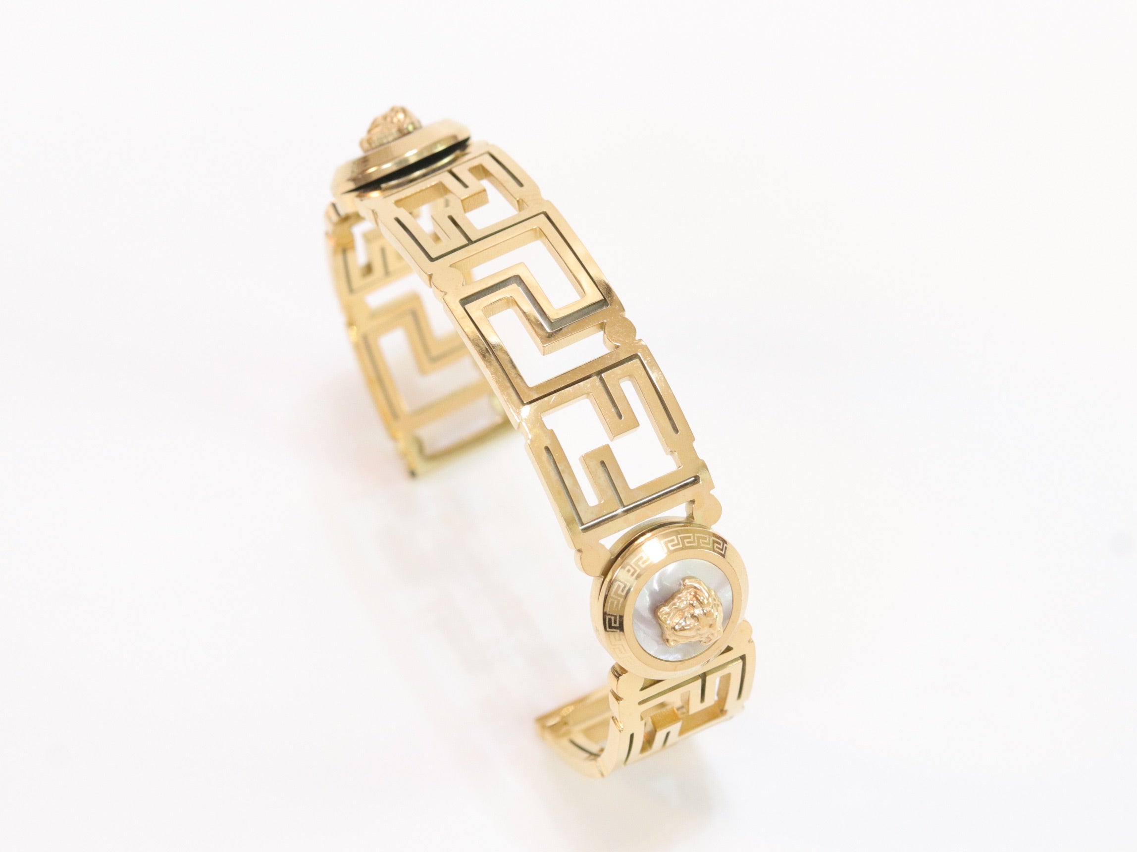 Alphabet V and Medusa Open Bracelet with gold finish