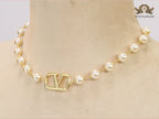 Alphabet V pearl and gold necklace