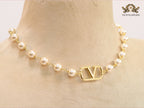 Alphabet V pearl and gold necklace