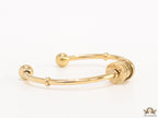 Gold plated bracelet with alphabet inscribed motif