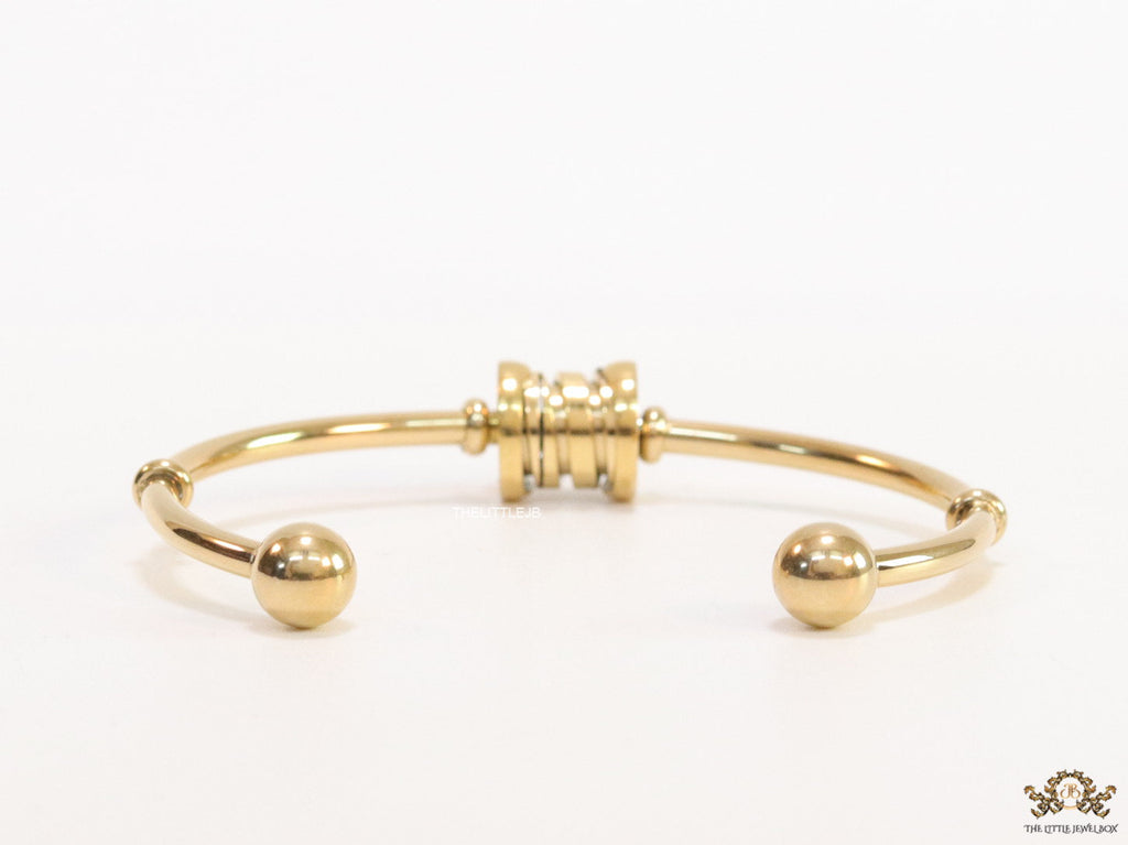 Gold plated bracelet with alphabet inscribed motif