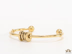 Gold plated bracelet with alphabet inscribed motif