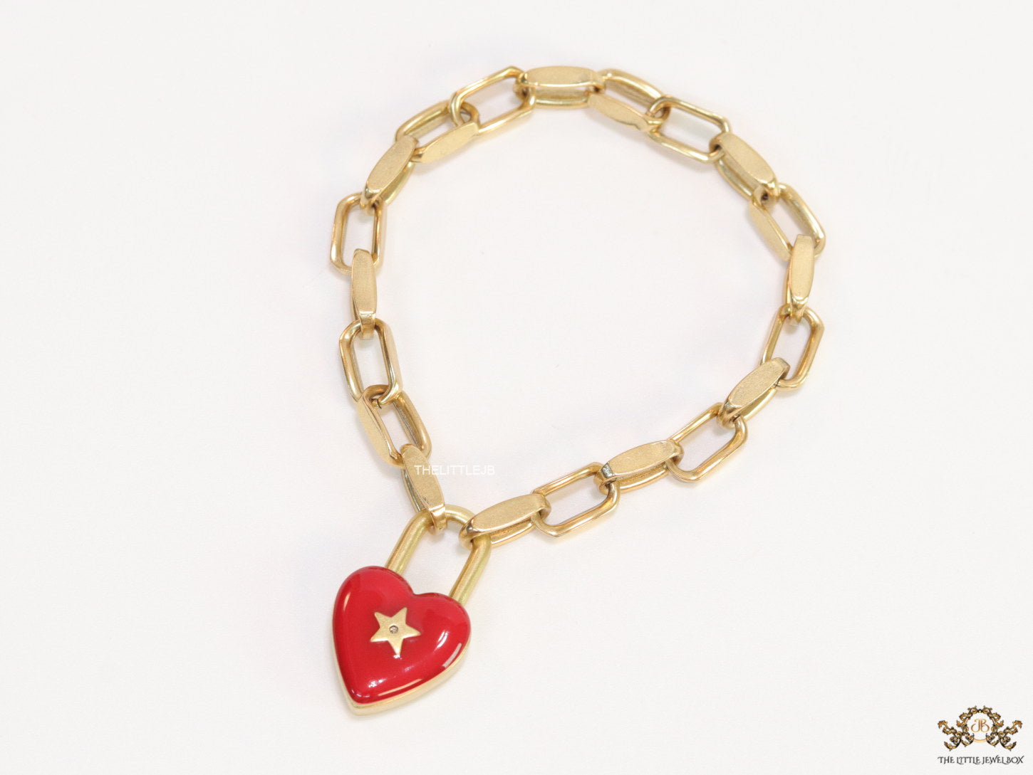 Gold plated link chain bracelet with heart shape lock
